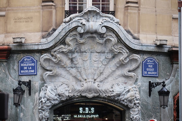 Detail of the facade of a building in Art Nouveau Style on the boulevard Madeleine in Paris