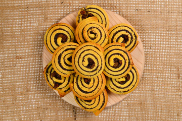 Home made baked cookies with raisins and poppy seeds. Space for text or design.