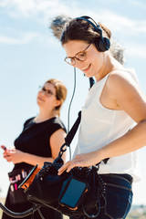 Sound engineer with microphone on a video production set