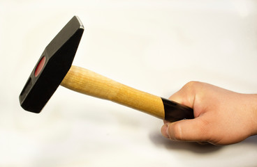 hammer in hand isolated on white background