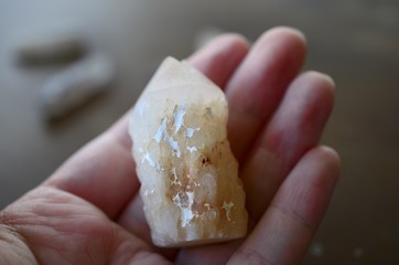 Clear Quartz crystal tower, carved crystal tower. Woman's hand holding clear quartz tower. Witchy decor, bohemian vibes. crystal healing, meditation crystals. Healing witch.Clear Quartz crystal tower,