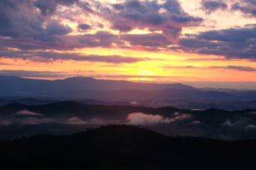 Mist in the mountain hills with morning light in Chiangrai, north of Thailand