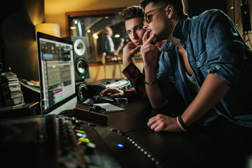Sound engineer working in a music studio