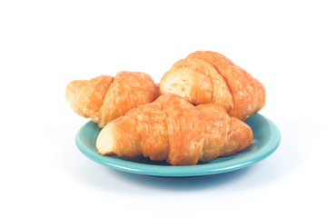 Home made fresh croissant on white background.