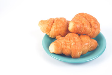 Home made fresh croissant on white background.
