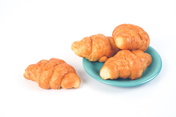 Home made fresh croissant on white background.