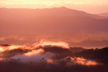 Mist in the mountain hills with morning light in Chiangrai, north of Thailand