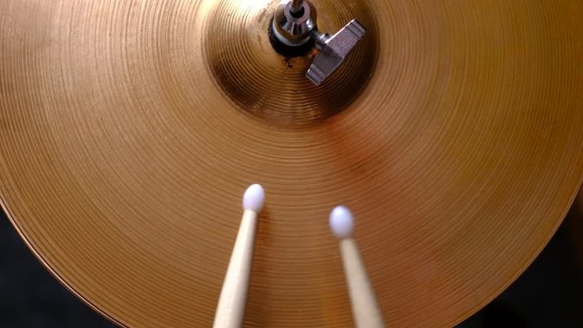 Close up of drum plate hi hat and a drummer playing on drums. Top view. 4k.
