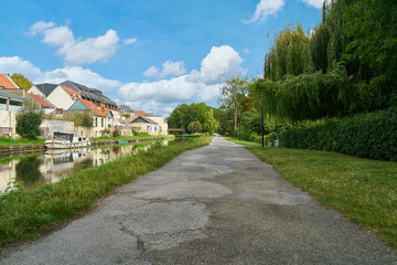 Empty path beside canal in Amiens, France