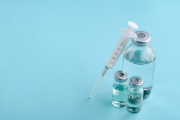 Bottle, vials and syringe
