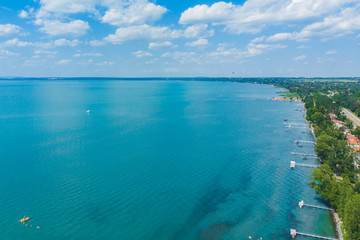 aerial view of lake with swimming people. summer time