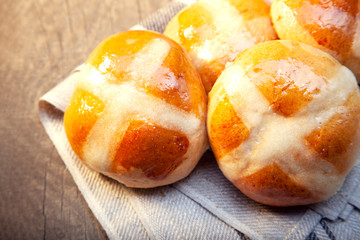 Hot cross buns on basket Top view, copy space. Easter baking