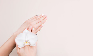 Manicure and flower composition.