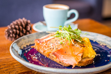 Salmon Scramble Sandwich Creamy scrambled egg, smoked salmon, sliced cheese, caramelised onion & mixed green.