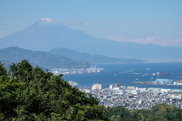 Japan city view overlooking Mt. Fuji and the sea.