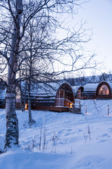 Snow covered winter cabin or Gabba designed after the Sami tribe lavvu (tent)
