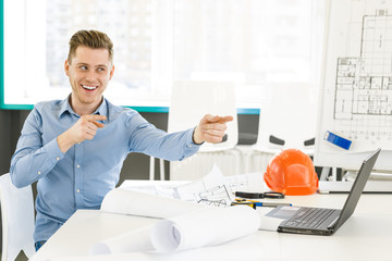 Young businessman working at the office