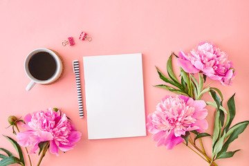 Mockup white notebook with pink peonies on a pink background