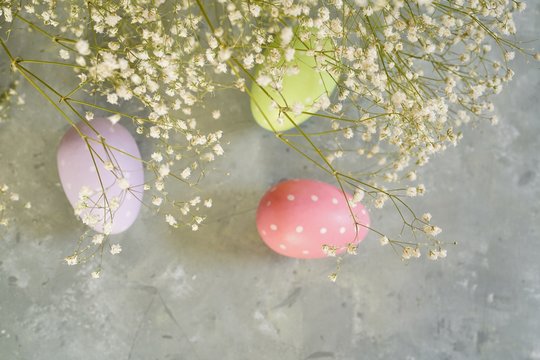 Spring Easter background with floers and eggs, selective focus
