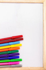 Obraz premium Blank whiteboard and Magic color row. Copy Placed or space for text.