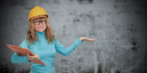 Obraz na płótnie Canvas woman with isolated construction helmet