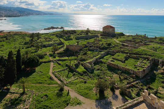Panorama of Byblos archeological site with Phoenician ruins, ancient Roman buildings and a Crusader castle fort on the Mediterranean Sea, in Jbeil, Lebanon