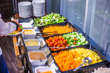 Salad food with colorful vegetable on slad bar