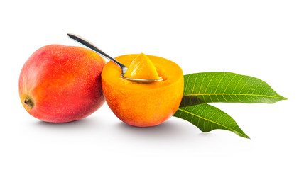 Beautiful composition of two ripe american mangoes sliced with a spoon on white background