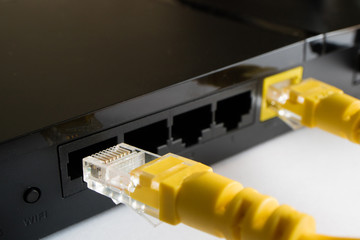 disconnecting the yellow cable from the router
