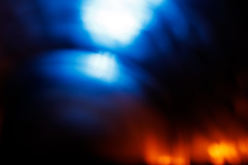 Lens Flare. Light over black background. Easy to add overlay or screen filter over photos. Abstract sun burst with digital lens flare background. Gleams rounded and hexagonal shapes, rainbow halo.