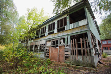 Old abandoned spooky wooden house. Horizontal color photography.