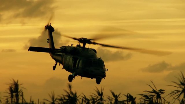 Helicopter taking off in the sunset 2