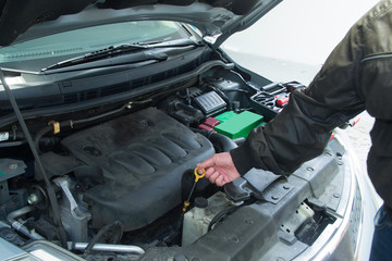 Performing car repair in a home garage to provide safe transportation .