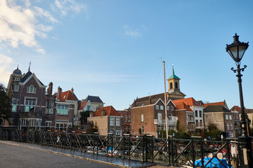 Obraz premium Dordrecht city - typical facade and buildings with waterways - Netherlands - Holland.
