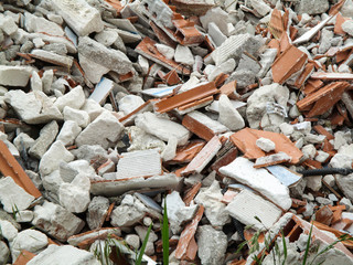 pile of construction debris with bricks and rubble