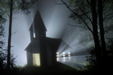 Light emitting from old church in forest at night