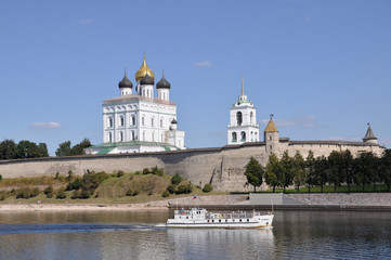 View of the Trinity Cathedral in the Pskov Kremlin from the Great River, on which the ship sails on...
