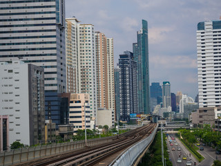 Fototapeta na wymiar Modern city building with railway of train in Bangkok