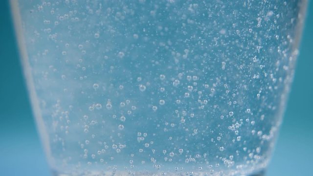 bubbles from aspirin tablet dissolves