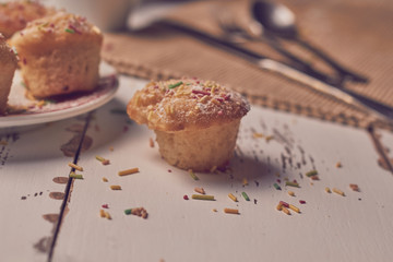 muffins with sugary chips and coffee