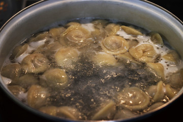 Russian dumplings, modeling of dough and meat.