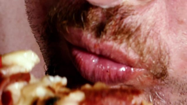 Fat man eating pizza, extreme close up, unhealthy lifestyle concept
