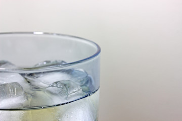 Ice cold drink on the rocks summertime liquid beverage