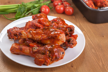 Baked chicken legs with tomato barbecue sauce