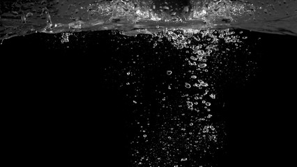 Blurry images of soda liquid water bubbles or carbonate drink or oil shape or beer fizzing or splashing and floating drop in black background for represent sparkling and refreshing