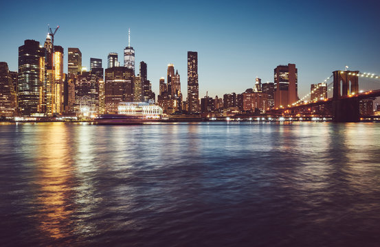 Manhattan at blue hour, color toned picture, New York City, USA.