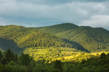 Obraz premium Beautiful summer mountain landscape with a blue sky before a thunderstorm