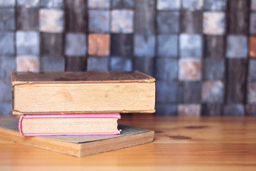 books on wooden table