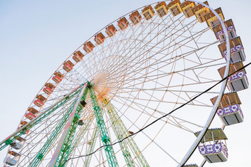 France Avignon, an empty ferris wheel in pastel colors at sunset in the summer.