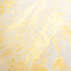 Abstract golden textured hand painted background closeup